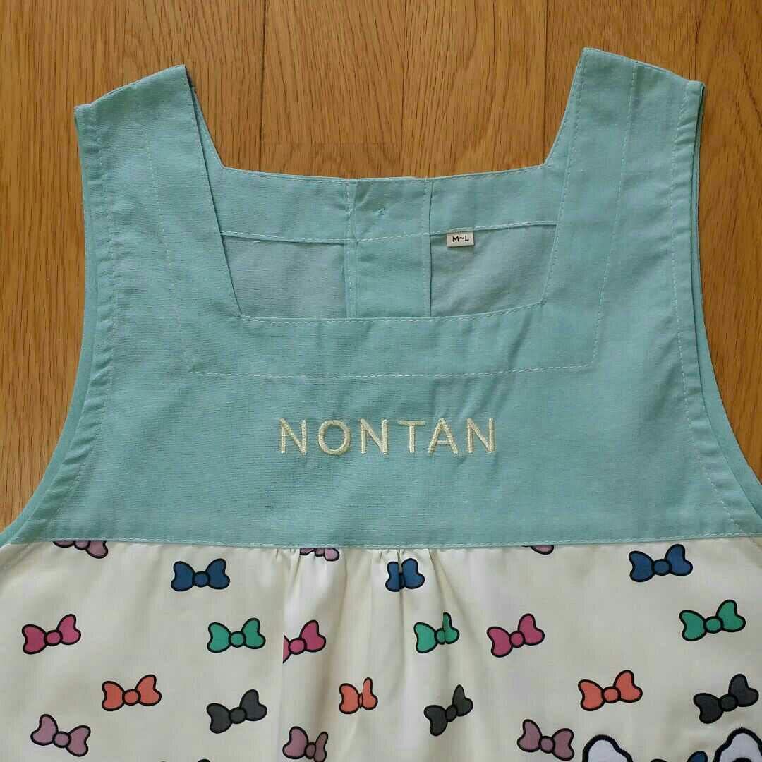 ノンタン　エプロン　保育士　タータン　リボン　M L 割烹着　先生　リボン　新品 ノンタン エプロン 保育士 幼稚園 介護士 タータンリボン M-L